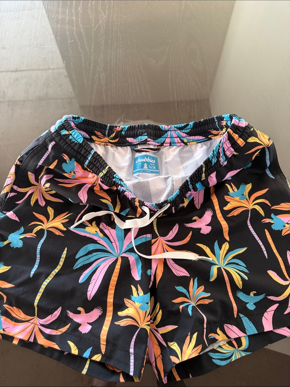 Chubbies Black Tropical Palm Print Swim Shorts with Pink Teal and Orange Accents